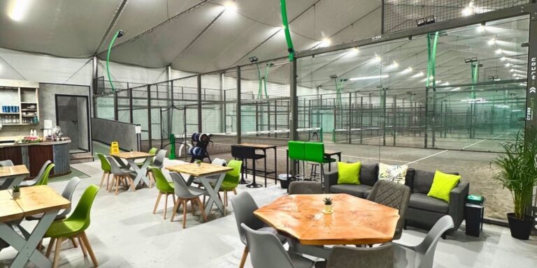 High-pressure cleaning tennis courts with professional surface maintenance services.